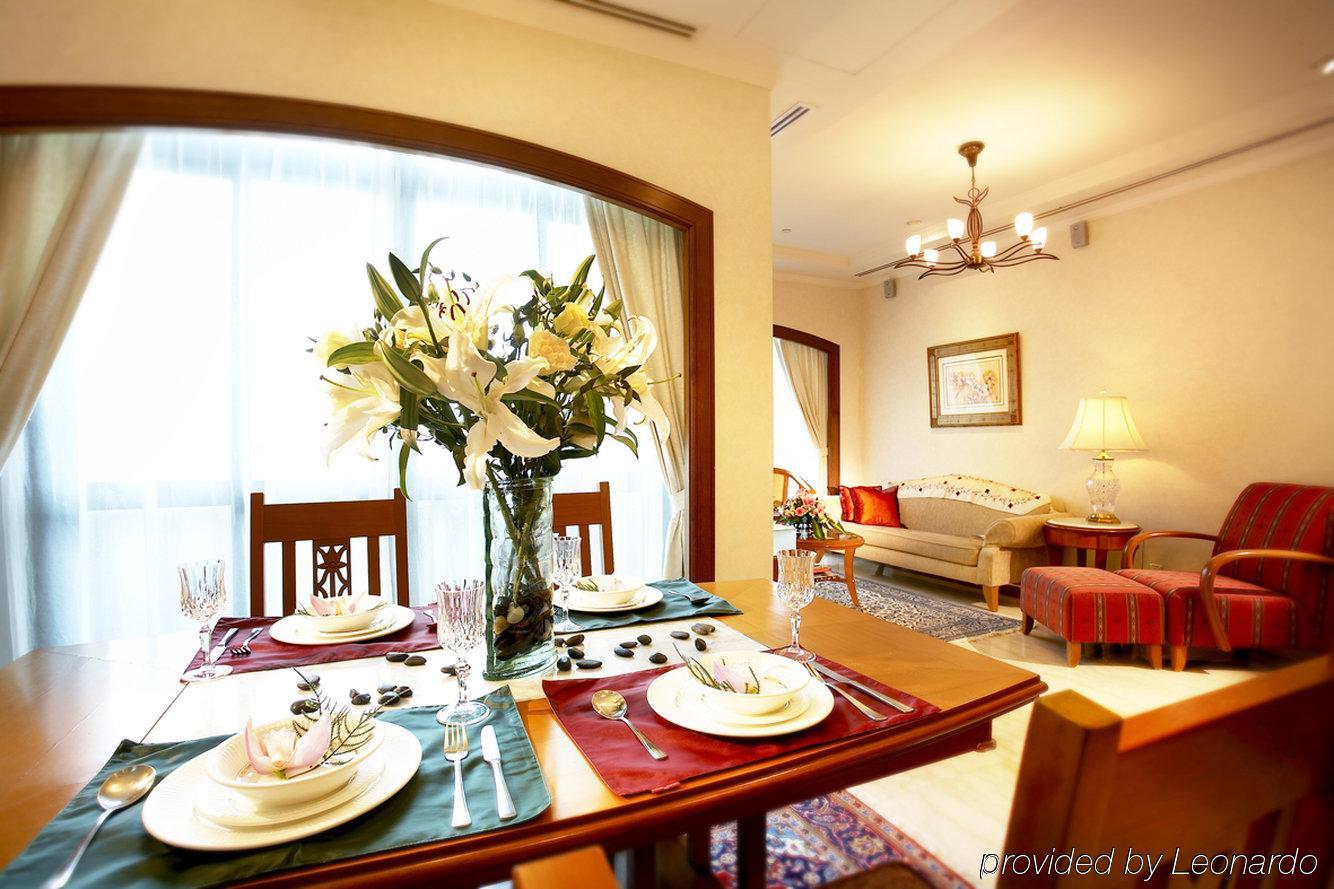 Fraser Suites סינגפור מסעדה תמונה